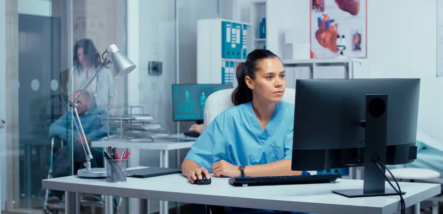 Lady using a desktop computer