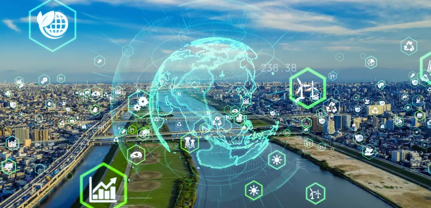 A translucent globe with various icons representing sustainability, technology, and infrastructure is superimposed over an aerial view of a modern city.