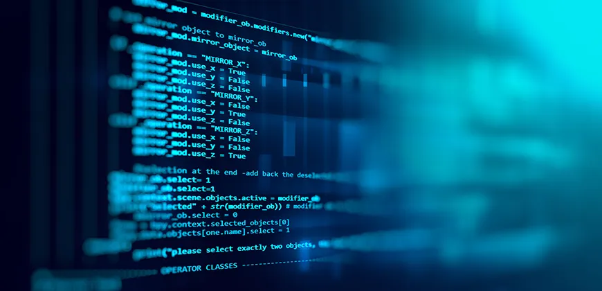 A close-up image of blue computer code scrolling across a dark screen.