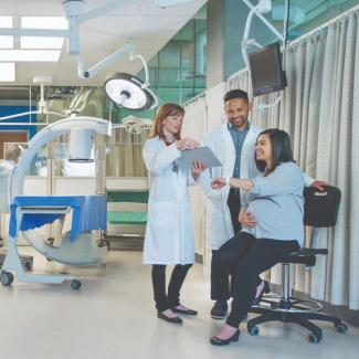 Nurses taking care of a patient